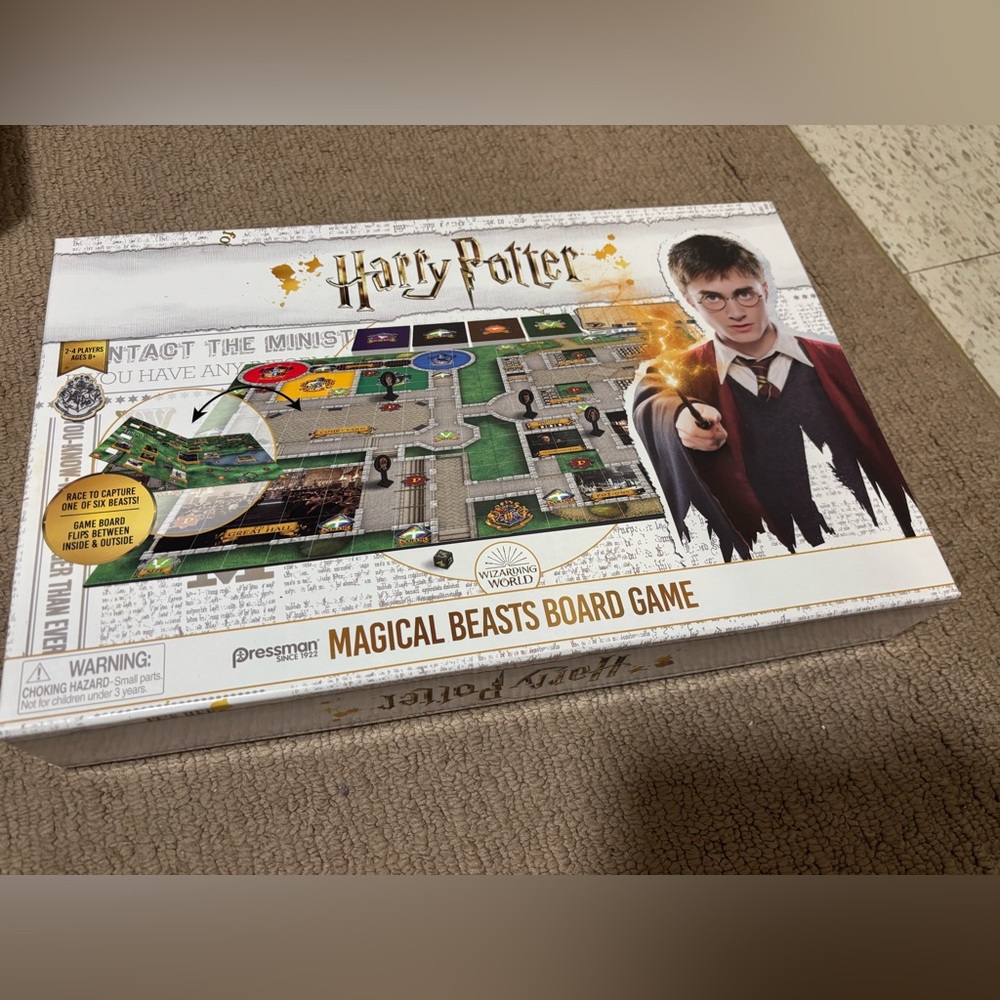 Harry Potter Magical Beasts Board Game (opened) and HP Trivial Pursuit (sealed)